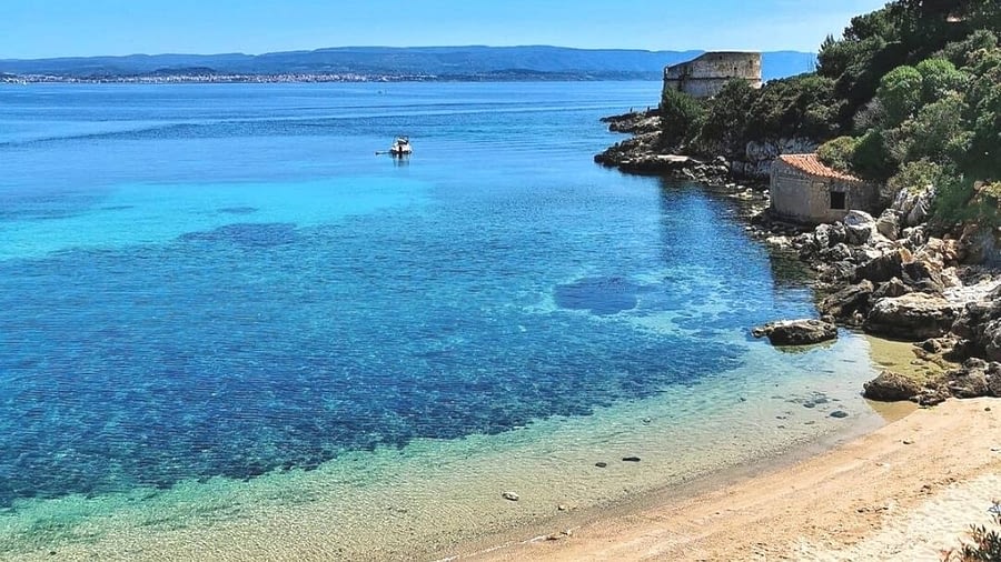The Lazzaretto Coves in Alghero: A Paradise of History and Crystal-Clear Sea